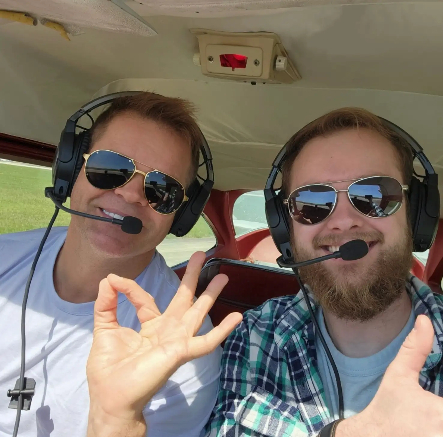 Elite Flight Training student and flight instructor in a Cessna airplane cockpit