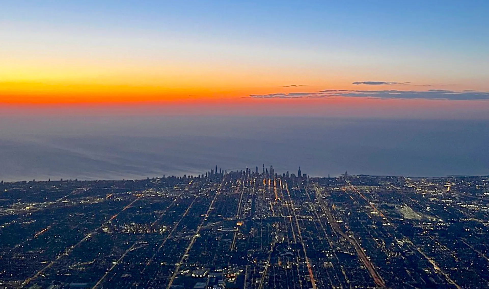 elite flight training commercial pilot student flying over the city