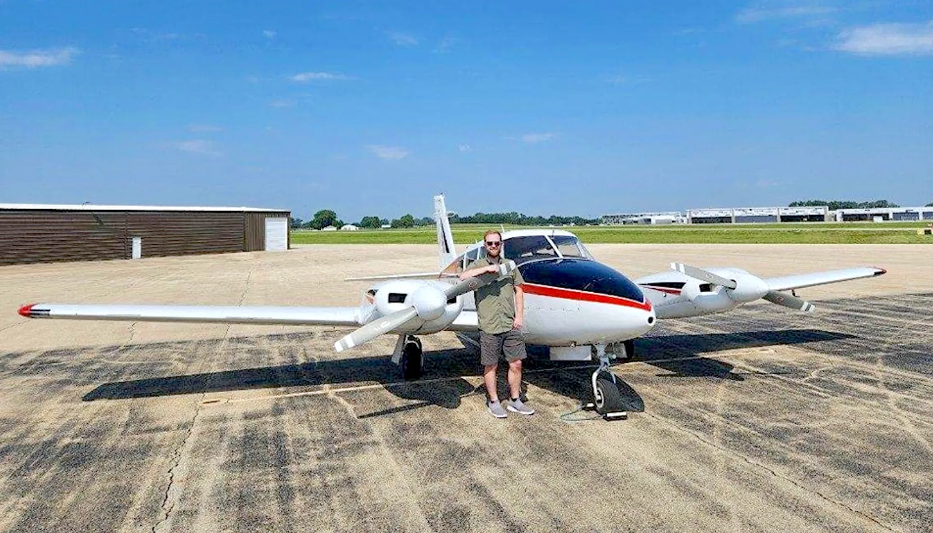 Elite Flight Training multi engine rating student next to a Piper Seminole