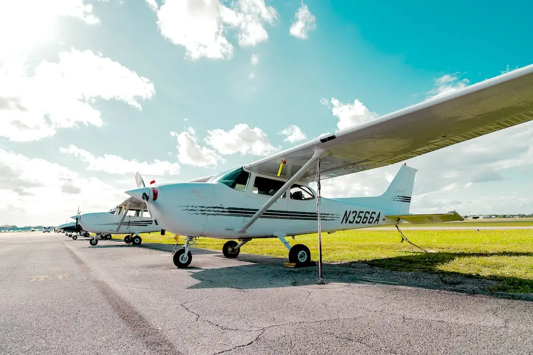 Elite Flight Training airplane parked on the runway at the airport